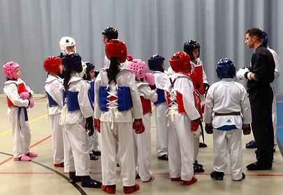 Students sparring in a supervised class