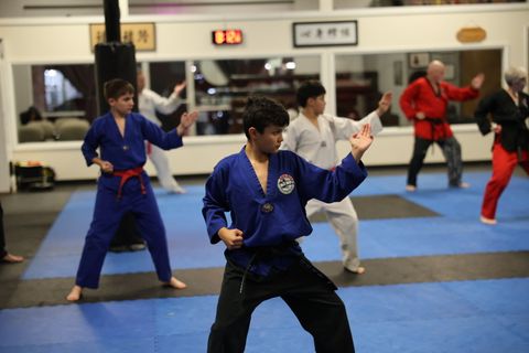 Youth students training in Taekwondo