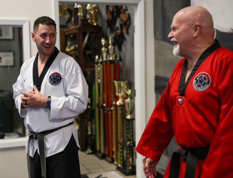 Instructors talking at Lone Star Institute of Taekwondo